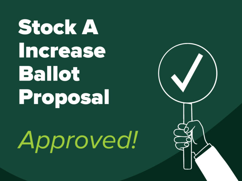 graphic of a hand holding a voting paddle with a checkmark, text says stock a increase ballot proposal approved