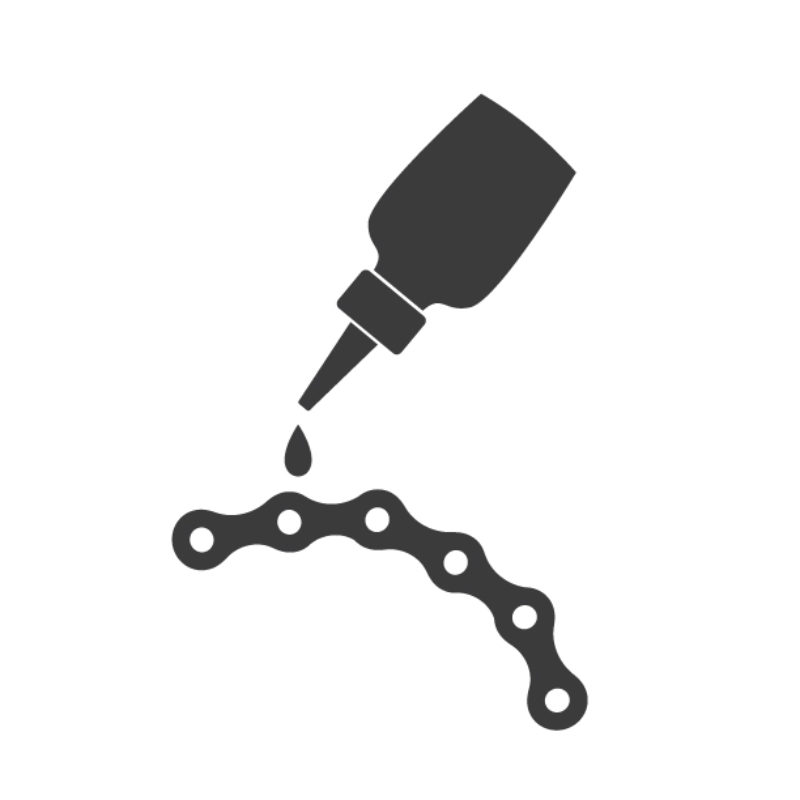 A black icon of a bike chain being lubricated