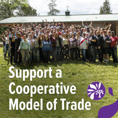 A photo of worker owners from Equal Exchange with text reading "Support a Cooperative Model of Trade"