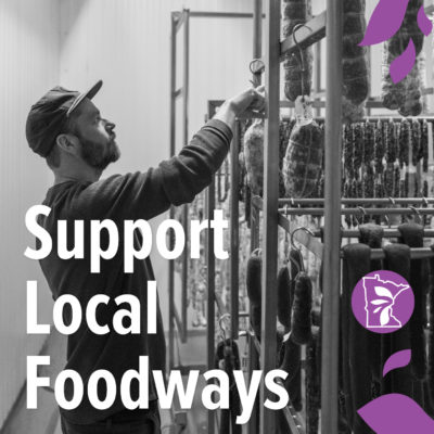 A black and white photo of someone working with meats with text overlay reading "support local foodways"