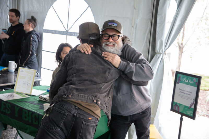 Two people hugging at the 2024 CSA Fair