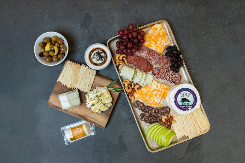 A charcuterie board with goat cheese