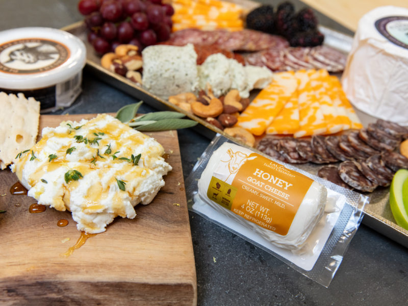 A close up of a charcuterie board with goat cheese