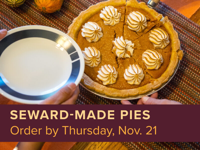 A picture of a pie with text reading "Seward-Made Pies: Order by Thursday Nov. 21"