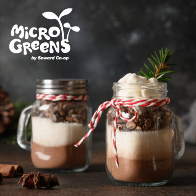 Jars of hot chocolate mix with text overlay reading "Microgreens"