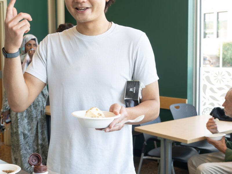 shopper smiling and holding ice cream