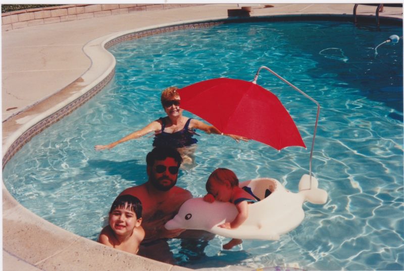 A group of family members in a pool