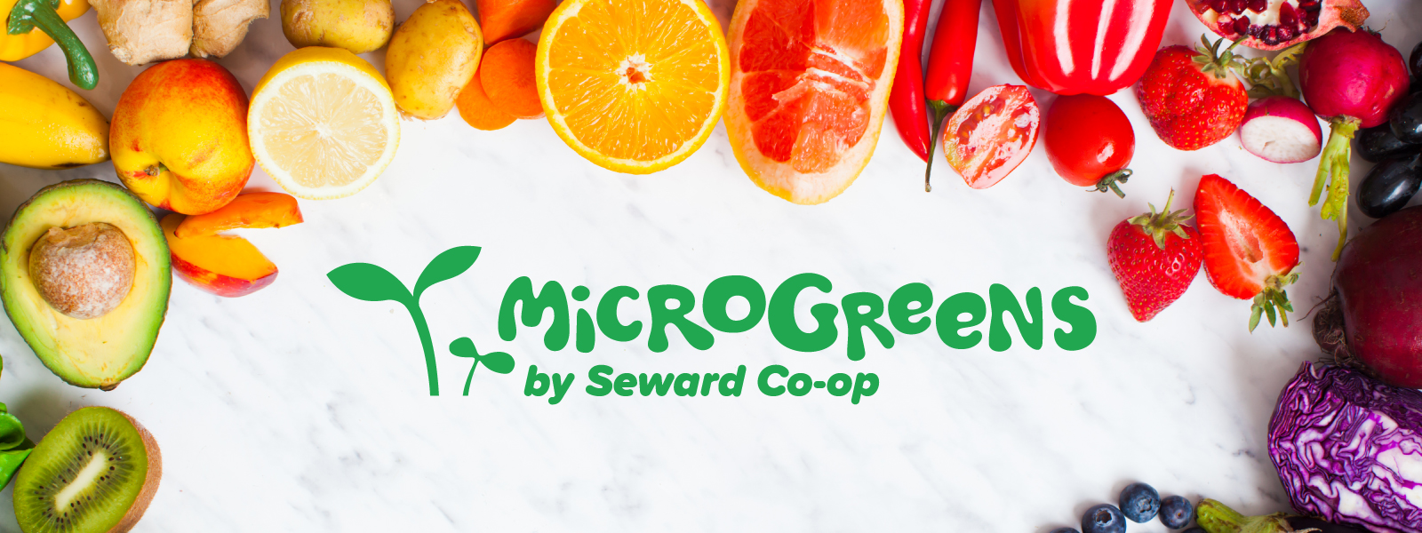 Colorful veggies and fruits surrounding the text "Microgreens by Seward Co-op"