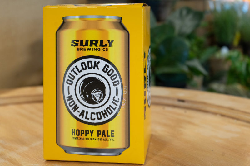 A box of Surly Hoppy Pale non-alcoholic canned beverages
