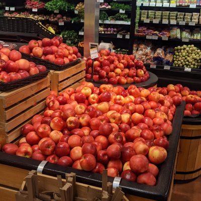 pile of apples in the Franklin store entry produce display