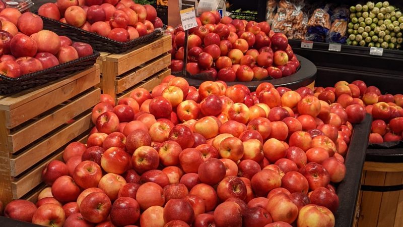 pile of apples in the Franklin store entry produce display