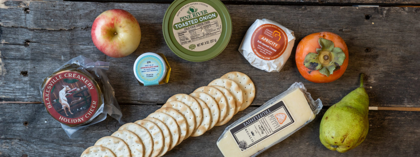 An assortment of cheeses on a board