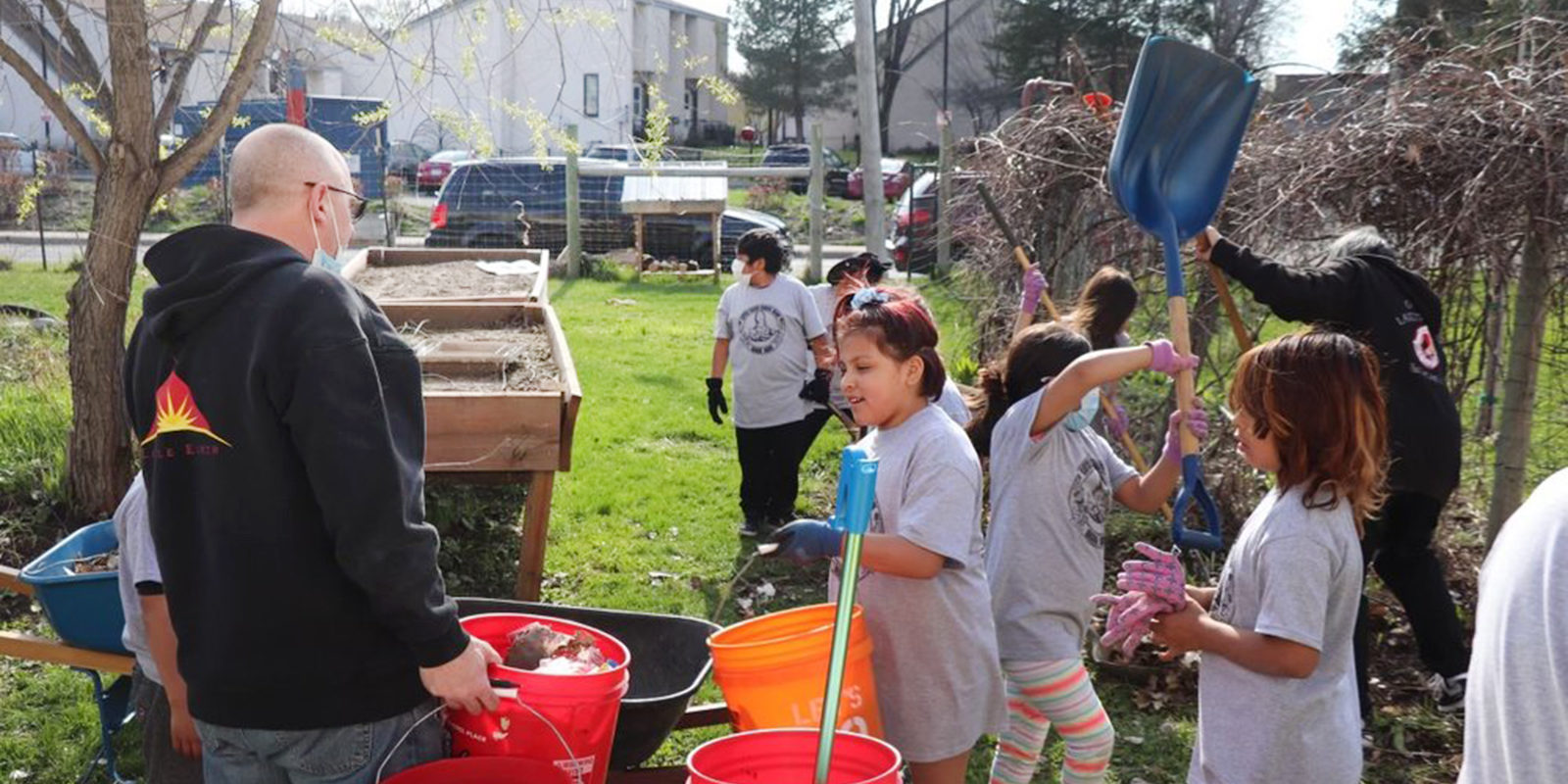 A group of children helping on a farm